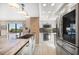 Modern kitchen featuring stainless steel appliances and granite countertops at 74 Gulf Blvd # 2B, Indian Rocks Beach, FL 33785