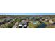 An aerial view highlights community ponds, a pool, and manicured grounds at 8350 Savannah Trace Cir # 1808, Tampa, FL 33615