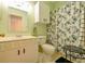 Bright bathroom featuring decorative accents, vanity, and shower-tub combination, with storage space at 8350 Savannah Trace Cir # 1808, Tampa, FL 33615