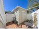 Enclosed brick patio with storage shed, table and chairs, and privacy fence, ideal for outdoor relaxation at 8350 Savannah Trace Cir # 1808, Tampa, FL 33615
