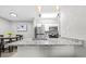 Well-lit kitchen showcasing granite countertops and stainless steel appliances, perfect for modern living at 9100 Dr Martin Luther King Jr N St # 1508, St Petersburg, FL 33702