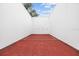 Interior of outdoor community racquetball court with smooth white walls at 9100 Dr Martin Luther King Jr N St # 1508, St Petersburg, FL 33702