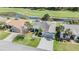 Charming single Gathering home with mature landscaping on a golf course with a water view at 10237 Collar Dr, San Antonio, FL 33576