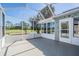 Screened patio providing picturesque views of the pond and golf course at 10237 Collar Dr, San Antonio, FL 33576