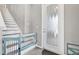 Inviting entryway with stairs and a frosted glass front door at 10432 High Noon Trl, Parrish, FL 34219