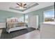 Spacious main bedroom with tray ceiling and plenty of storage space at 10432 High Noon Trl, Parrish, FL 34219