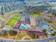 Aerial view of expansive community recreational facilities and surrounding neighborhood at 1504 Valley Forge Blvd, Sun City Center, FL 33573
