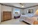Comfortable bedroom featuring a scenic view from its window and a ceiling fan at 1504 Valley Forge Blvd, Sun City Center, FL 33573