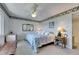 Comfortable bedroom with a ceiling fan and plenty of furniture at 1504 Valley Forge Blvd, Sun City Center, FL 33573
