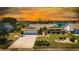 Charming single-story home boasts lush landscaping, a two-car garage at 1504 Valley Forge Blvd, Sun City Center, FL 33573