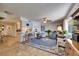 Inviting living area featuring built-in shelving, comfortable seating, and an open layout at 1504 Valley Forge Blvd, Sun City Center, FL 33573