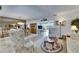 Open-concept living room boasts views and a neutral color palette at 1504 Valley Forge Blvd, Sun City Center, FL 33573