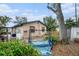 Home exterior with a shady spot and mature greenery at 1720 34Th N Ave, St Petersburg, FL 33713