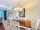 Inviting dining room with classic decor and ample natural light at 19724 Fort King Run, Brooksville, FL 34601