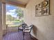 Enjoy a view of this community from the covered front porch of this home at 19724 Fort King Run, Brooksville, FL 34601