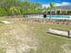 Horseshoe pits and lush landscaping near the community pool and clubhouse at 19724 Fort King Run, Brooksville, FL 34601