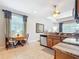 A kitchen with stainless steel appliances, granite countertops, and a breakfast nook by a window at 19724 Fort King Run, Brooksville, FL 34601