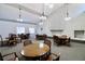 Large clubhouse area with tables and chairs, great for social gatherings and community events at 2630 Pearce Dr # 107, Clearwater, FL 33764