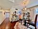 Nicely decorated dining room with elegant rug, light fixture, and wood floors at 2630 Pearce Dr # 107, Clearwater, FL 33764
