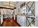 Charming eat-in kitchen featuring stainless steel appliances, granite countertops, a window and a custom cabinet at 2630 Pearce Dr # 107, Clearwater, FL 33764