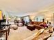 Comfortable living room area featuring large window for ample natural light at 2630 Pearce Dr # 107, Clearwater, FL 33764