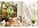 Well-maintained patio with beautiful greenery and decorative accents at 2630 Pearce Dr # 107, Clearwater, FL 33764