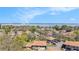 Aerial view of property showcasing surroundings with lake and the bridge at 2934 Lichen Ln # C, Clearwater, FL 33760