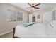 Bedroom featuring a window and two separate closets at 2934 Lichen Ln # C, Clearwater, FL 33760