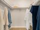 Walk-in closet offering ample storage space with shelves and hanging rods at 2934 Lichen Ln # C, Clearwater, FL 33760