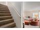 Inviting living room with modern furnishings visible from the stairway at 2934 Lichen Ln # C, Clearwater, FL 33760