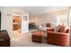 Open-concept living room seamlessly connects to the dining area and the kitchen at 2934 Lichen Ln # C, Clearwater, FL 33760