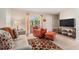 Bright living room with sliding glass doors offering plenty of natural light at 2934 Lichen Ln # C, Clearwater, FL 33760