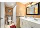 Clean bathroom featuring double sinks and a shower with curtain at 3600 42Nd S St # 52B, St Petersburg, FL 33711