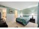 Well-lit bedroom with access to bathroom and closet at 3600 42Nd S St # 52B, St Petersburg, FL 33711