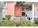 Charming condo exterior with a palm tree and white stairway at 3600 42Nd S St # 52B, St Petersburg, FL 33711