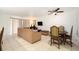 Bright and airy living area with comfortable seating, a ceiling fan, and tile floors for easy upkeep at 3600 42Nd S St # 52B, St Petersburg, FL 33711