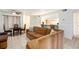 Bright living room with a large sectional sofa and tile floors at 3600 42Nd S St # 52B, St Petersburg, FL 33711