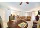 Comfortable living area with modern decor, dining space, and seamless flow to an adjacent kitchen space at 3600 42Nd S St # 52B, St Petersburg, FL 33711