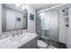 Updated bathroom with a glass enclosed shower and modern vanity at 36750 Us Highway 19 N # 6-214, Palm Harbor, FL 34684
