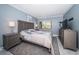 Comfortable bedroom with a plush bed, natural light, and stylish decor at 36750 Us Highway 19 N # 6-214, Palm Harbor, FL 34684