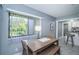Charming dining area with tile floors and a scenic view from the window at 36750 Us Highway 19 N # 6-214, Palm Harbor, FL 34684