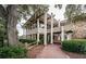 Modern building with an inviting entrance and well-kept landscaping at 36750 Us Highway 19 N # 6-214, Palm Harbor, FL 34684