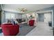 Inviting living space with tile floors, open layout, and comfortable seating area at 36750 Us Highway 19 N # 6-214, Palm Harbor, FL 34684