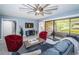 Spacious living room boasting large windows, comfortable seating, and stylish decor at 36750 Us Highway 19 N # 6-214, Palm Harbor, FL 34684