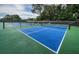 Outdoor pickleball court in a well-maintained community at 36750 Us Highway 19 N # 6-214, Palm Harbor, FL 34684