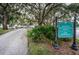 Signage for tennis and racquetball center and the golf institute at 36750 Us Highway 19 N # 6-214, Palm Harbor, FL 34684