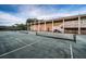 Beautifully maintained tennis courts with a view of the clubhouse at 36750 Us Highway 19 N # 6-214, Palm Harbor, FL 34684