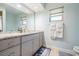 Bathroom features updated vanity with granite countertops and ample storage at 4383 Biscayne Dr, Hernando Beach, FL 34607