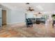 Spacious living room with tile flooring, ceiling fans, and ample natural light at 4383 Biscayne Dr, Hernando Beach, FL 34607