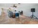 Bright and airy living room with tile floors, ceiling fans, and comfortable sectional sofa at 4383 Biscayne Dr, Hernando Beach, FL 34607